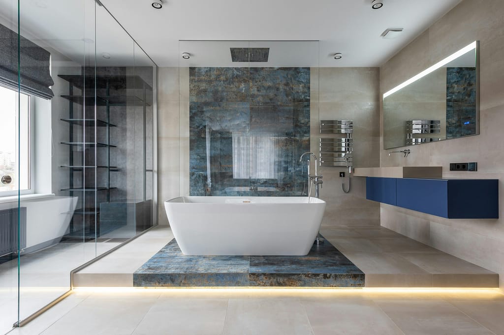 Elegant bathroom featuring a ceramic freestanding tub and contemporary design elements.