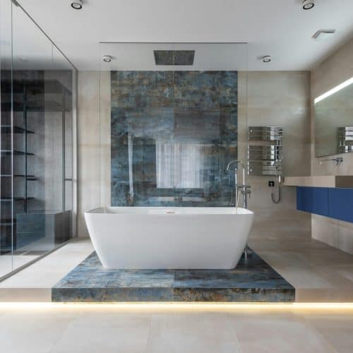 Elegant bathroom featuring a ceramic freestanding tub and contemporary design elements.