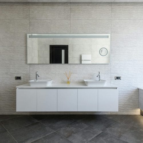 Elegant bathroom with minimalist design and modern fixtures.